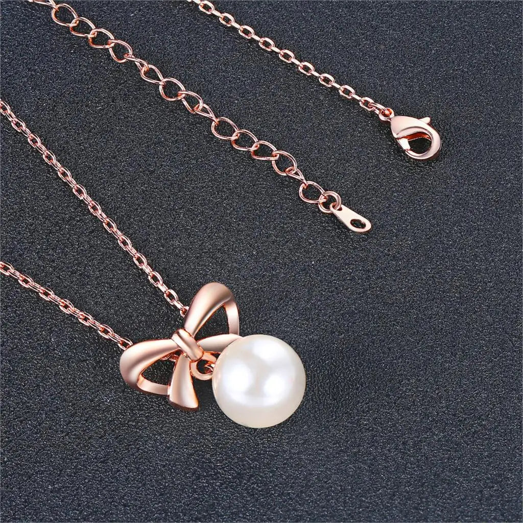 BOW PEARL PENDANT NECKLACE