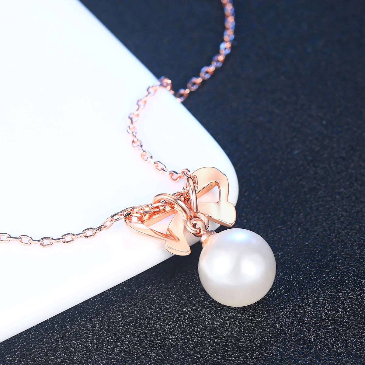 BOW PEARL PENDANT NECKLACE