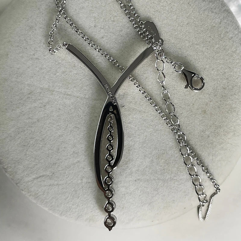 MOISSANITE CROSS SILVER NECKLACE