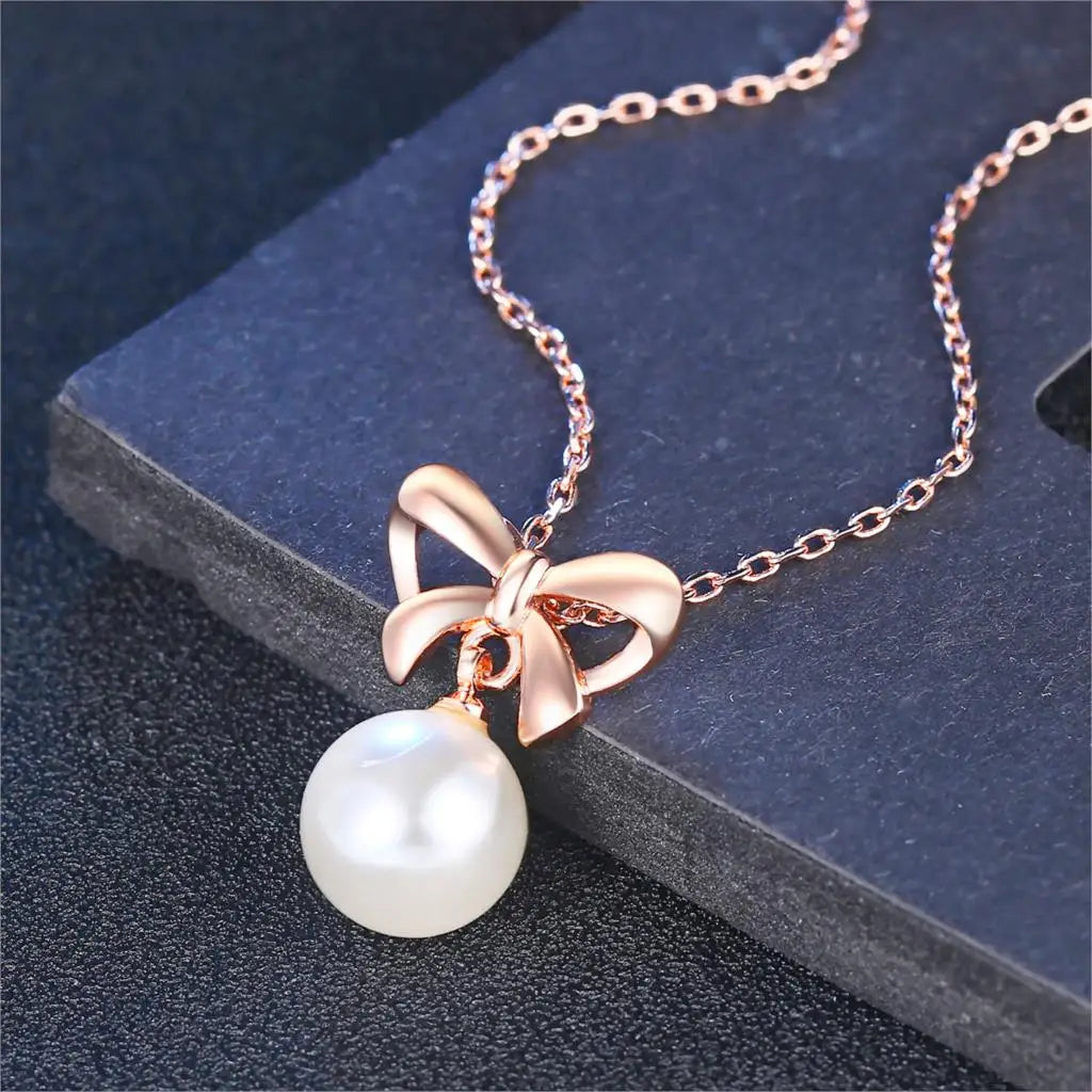 BOW PEARL PENDANT NECKLACE